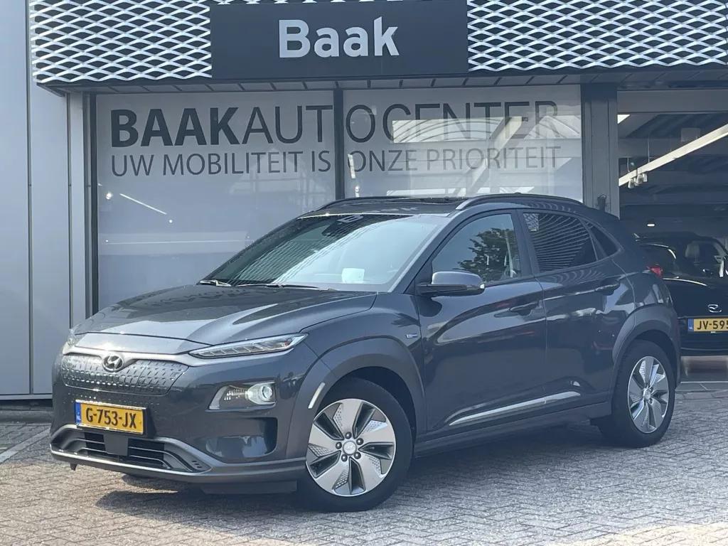 Hyundai Kona EV Premium 64 kWh | Schuifdak | Leer | Stoelventilatie | Camera